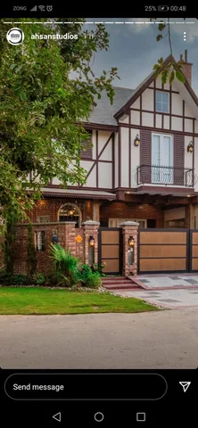Supplied social-story screenshot showing a gabled house, brick boundary, planted frontage and the visible ahsanstudios account credit.