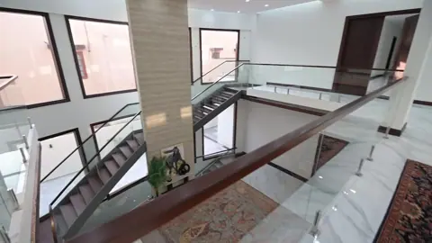 Ghalib Residence: A residential film following light, circulation and material detail. Filmed walkthrough.