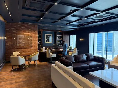 MESA interior details: A dark blue ceiling contrasts with exposed brickwork. Project photography.