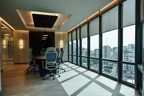 PSO House, 8th-floor rehabilitation, Karachi: The conference room opens to a broad city view. 8th-floor rehabilitation photography.