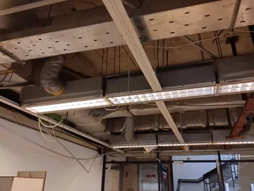 PSO 6th & 7th: Exposed ceiling services within an open framing grid. Work in progress · 22 January 2024.
